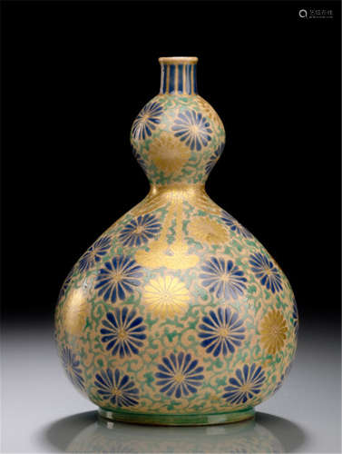 AN EARLY SATSUMA VASE, Japan, 18th Ct., all over decorated with blossoms of chrysanthemums in dark blue and gold surrounded by foliage on fine crazed ground - Property from an old German private collection, acquired before 1990 - Minor wear