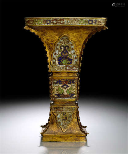 A GILT-BRONZE CHAMPLEVÉ VASE IN THE SHAPE OF A GU