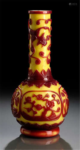 A YELLOW GLASS BOTTLE VASE WITH RED OVERLAY OF BLOSSOM BRANCHES AND CHILONG