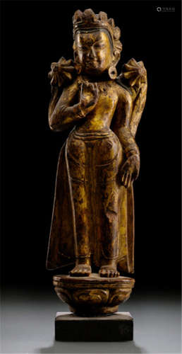 A GILT-WOOD FIGURE OF AN ATTENDANT, TIBET, CA