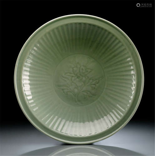 A RARE INSCRIBED LONGQUAN CELADON DISH, China, late Yuan/early Ming dynasty, the inscription at the base may be translated as 'The property of Hussain Khan'-Property from an important German private collection, bought from Spink & Sons Ltd