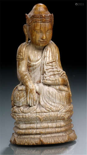 AN IVORY FIGURE OF THE SEATED BUDDHA, Burma, 17th/18th ct. - Property from a South German private collection, formerly from the Dr. Rumpf collection, acquired before 1990 - Traces of age, remains of white and red painting