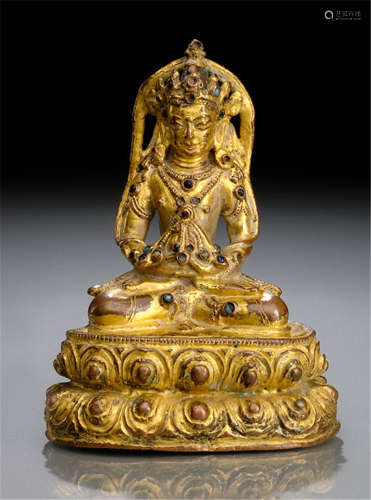 A GILT-BRONZE FIGURE OF AMITAYUS, TIBET, 15th ct