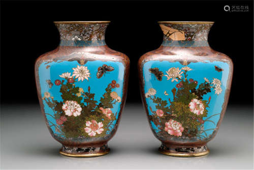 A PAIR OF POLYCHROME CLOISONNÉ ENAMEL VASES, Japan, Meiji period, both vases decorated with a floral arrangement of peonies and chrysanthemums with butterflies, the other side showing a site of Mount Fuji or a fisher boat - Minor wear, partly thin stresslines to surface