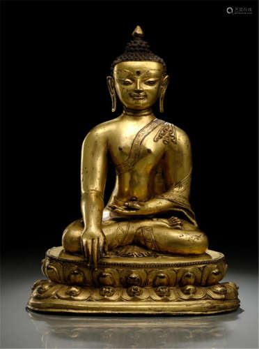 A LARGE GILT-BRONZE FIGURE OF BUDDHA SHAKYAMUNI, TIBET, late 15th ct