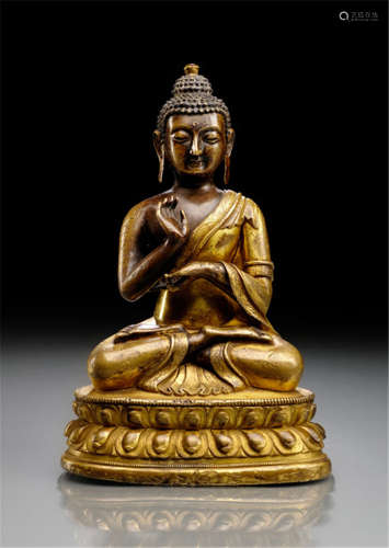 A PART-GILT BRONZE FIGURE OF SEATED BUDDHA SHAKYAMUNI