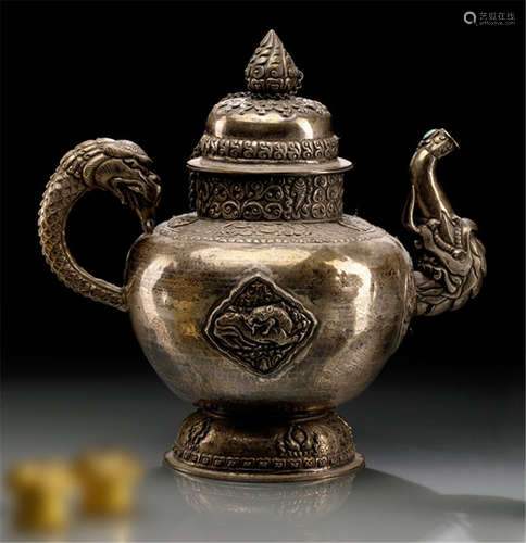 A LOW ALLOY SILVER EMBOSSED EWER, TIBET, 19th/20th Ct