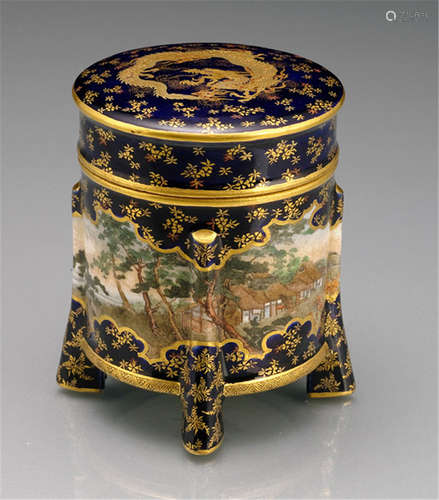 A SATSUMA BOX AND COVER, Japan, the inside of the cover with impressed seal: Kinkôzan, Meiji period,  the box and cover modelled as a hokkai box, decorated with a painted lake scenery, fine floral gold painting on dark blue ground, the top of the cover decorated with a dragon chasing a tâma - Minor wear