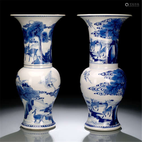 A NEAR PAIR OF UNDERGLAZE BLUE YENYEN VASES WITH CRANES AND DEER