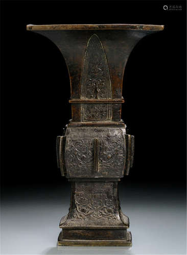 A GU-SHAPED BRONZE VASE IN ARCHAIC STYLE