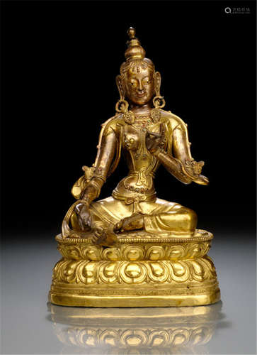 A GILT-COPPER EMBOSSED FIGURE OF SYAMATARA, TIBET, 18th Ct