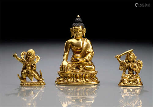 THREE GILT-BRONZE FIGURINES DEPICTING BUDDHA SHAKYAMUNI, MANJUSHRI AND VAJRAPANI, TIBTO-CHINESE, 19th ct