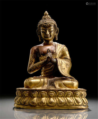 A GILT-BRONZE EMBOSSED FIGURE OF BUDDHA SHAKYAMUNI, TIBETO-CHINESE, 18th/19th ct