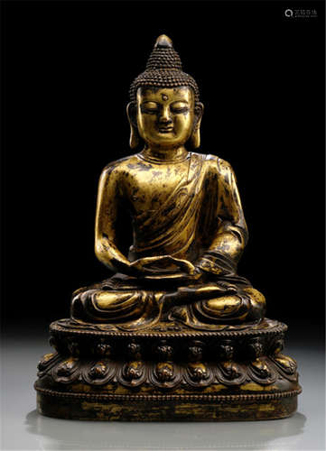 A BRONZE FIGURE OF BUDDHA SHAKYAMUNI, CHINA, probably Ming dynasty, seated in vajrasana on a lotus base with both hands resting in dhyanamudra on his lap, wearing monk's cloak and his face displaying a serene expression, resealed-Property from a South German private collection-Wear