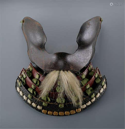 AN IRON MEMPÔ MOUNTED WITH A MOUSTACHE, Japan, Edo period - Property from an old South German private collection, acquired between the 1970s and 1980s - Minor wear, lacquered parts slightly chipped
