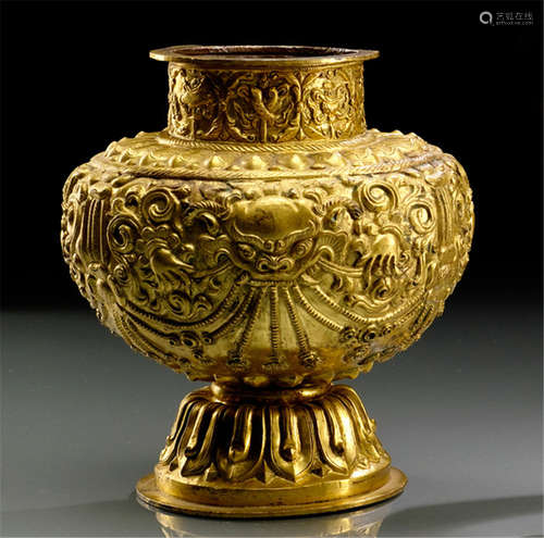 A GILT-COPPER EMBOSSED VASE, TIBET, 19th Ct