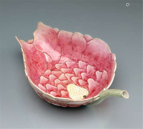 A TEXTURED LOTUS-SHAPED AND -COLOURED PORCELAIN BOWL