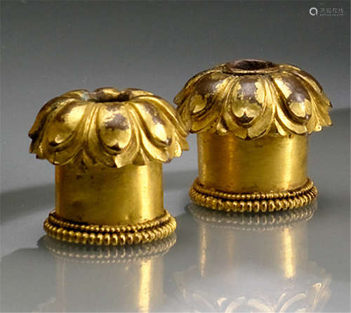 A PAIR OF GILT-BRONZE KNOBS, TIBET, 16th/17th Ct