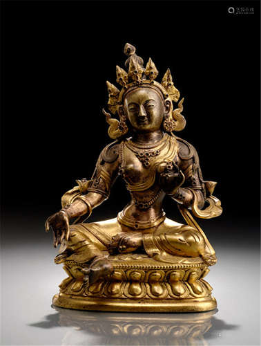 A PARTIAL GILT-BRONZE FIGURE OF SYAMATARA, TIBETO-CHINESE, 18th ct