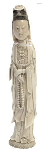 A MARITIME IVORY FIGURE OF STANDING GUANYIN, China, 19th ct. - Provenance: Bought prior 1990 in Stuttgart - Minor formation of cracks