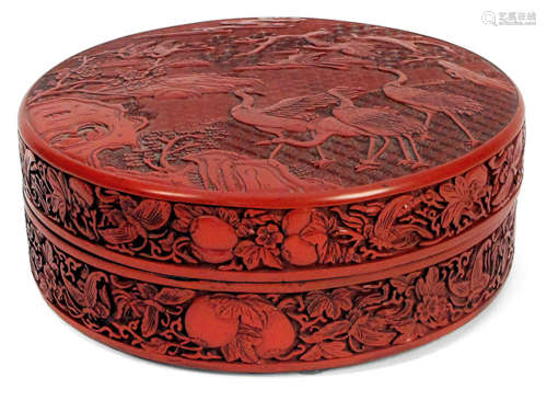 A CINNABAR LACQUER BOX AND COVER DEPICTING CRANES AMONG TREES, China, 20th ct. - Provenance: Bought prior 1990 in Stuttgart - Very slightly chipped
