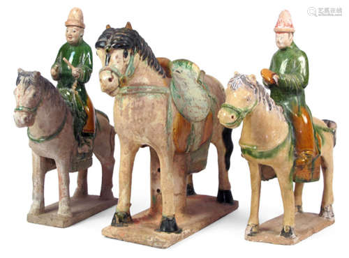 TWO SANCAI GLAZED MUSICIENS ATOP A HORSE AND ONE HORSE, China, Ming dynasty - Property from a South German private collection - Slightly chipped