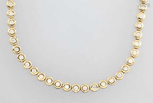 14 kt gold riviere necklace with brilliants