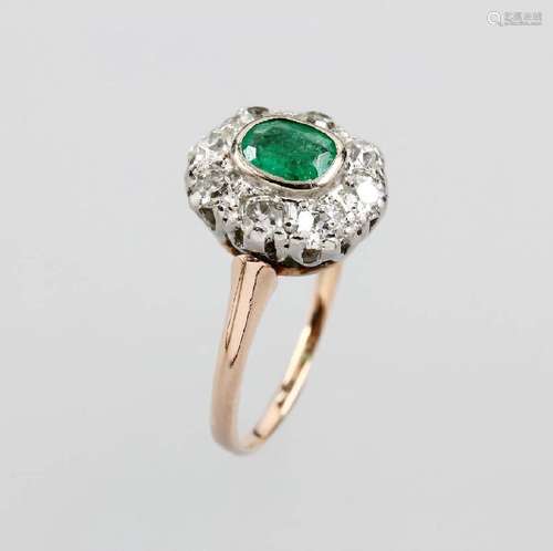 14 kt gold ring with emerald and diamonds