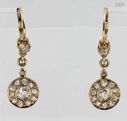 Pair of 14 kt gold earrings with diamonds