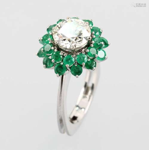 18 kt gold ring with brilliant and emeralds