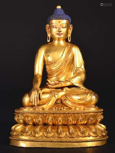 A GILT-BRONZE FIGURE OF BUDDHA , Ming Dynasty