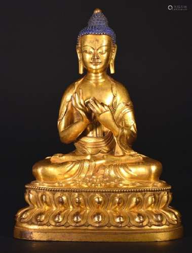 A GILT-BRONZE FIGURE OF SAKYAMUNI , Qing Dynasty