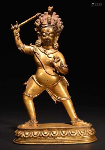 A GILT-BRONZE FIGURE OF ACALANATHA , Qing Dynasty