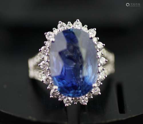 A WHITE GOLD,DIAMONDS AND BLUE SAPPHIRES RING