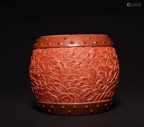 A CINNABAR LACQUER -GLAZED DRUM , Qing Dynasty