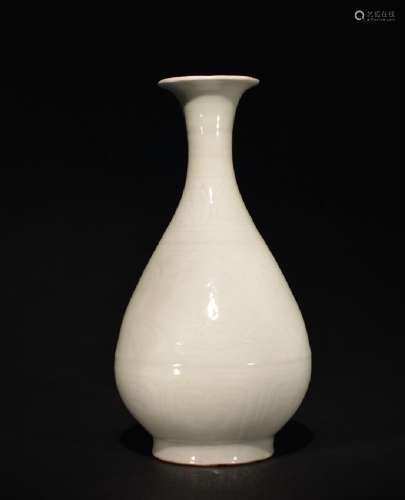 A CARVED WHITE-GLAZED VASE , Ming Dynasty