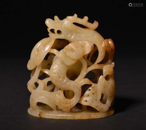 A CARVED YELLOW JADE DRAGON FINIAL , Ming Dynasty