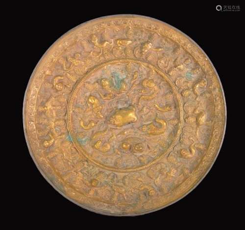 A GILT-BRONZE MIRROR , Tang Dynasty