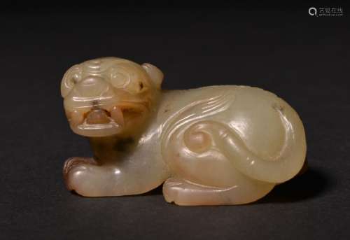 A CARVED YELLOW JADE LION , Ming Dynasty