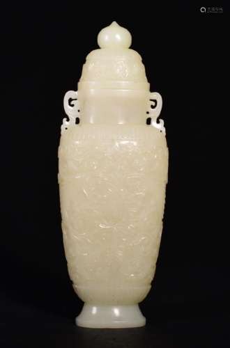 A FINE WHITE JADE CARVING OF VASE AND COVER , Qing