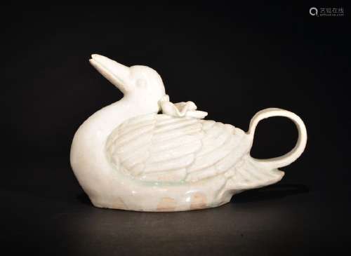 A CARVED CELADON-GLAZED DUCK , Song Dynasty