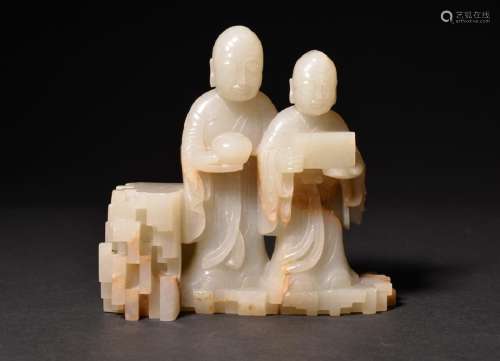 A CARVED WHITE JADE TWO-FIGURE , Qing Dynasty