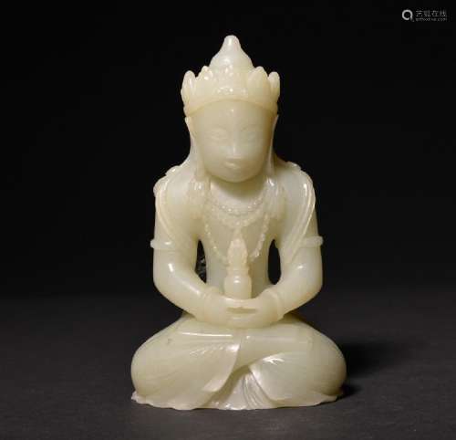 A FINE WHITE JADE CARVING OF AMITAYUS , Qing Dynasty