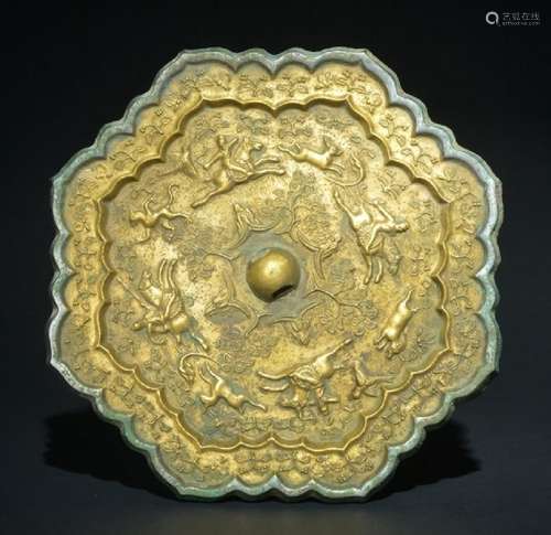 A GILT-BRONZE MIRROR , Tang Dynasty