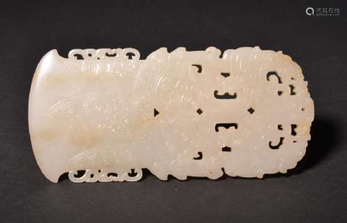 A FINE CARVED WHITE JADE AXE-SHAPED PENDANT , Qing