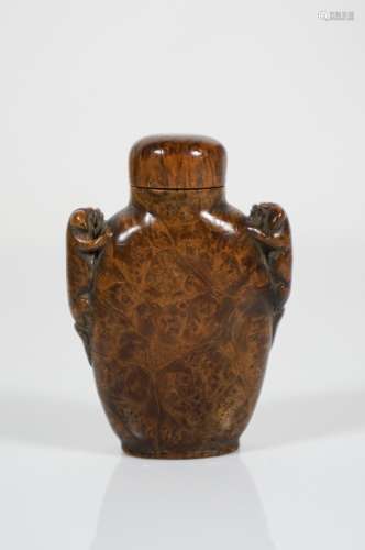 chinese hardwood snuff bottle with foolions