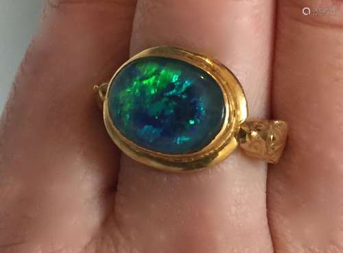 22KARAT YELLOW GOLD AND BLACK OPAL DOUBLET RING