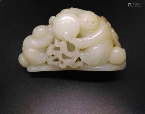 Chinese Jade Boy striking Drum, 10.6 cm x 4.3 cm x 6.3 cm