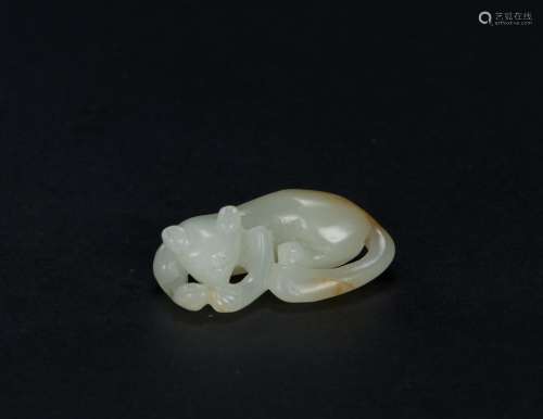 Qing - A Russet White Jade Carved Fox Toggle