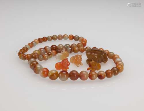 Republic - A Reddish Jadeite Beads Necklaces And Five Agate Animal